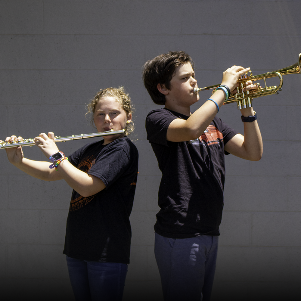 two Kids Playing Instruments